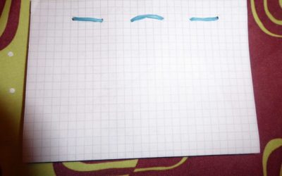 Faire un carnet ou cahier avec du papier à recycler.